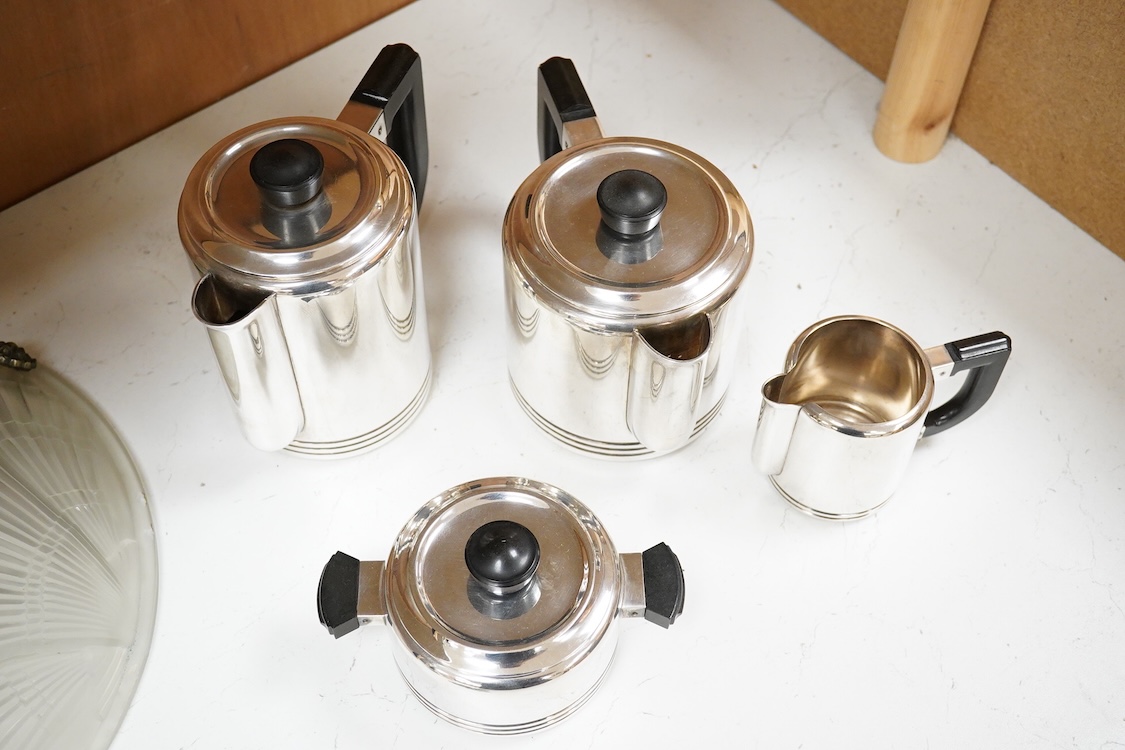 An Art Deco Christofle Gallia four piece silver plated tea set, largest 20cm wide